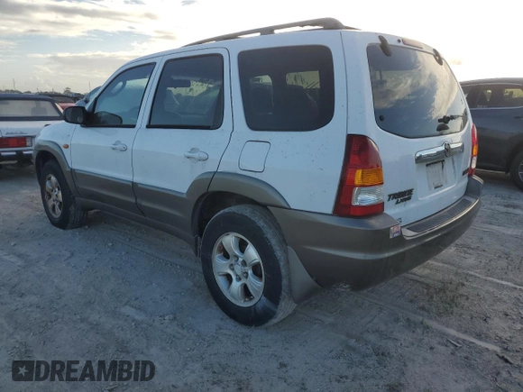 2002 Mazda Tribute LX with VIN 4F2YU09182KM09244, listed as a Copart auction lot 76758954 with Not Provided miles and Non Repairable. Bid and sale history available at carsss.com. Image 2.