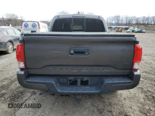 2016 Toyota Tacoma SR with VIN 3TMCZ5ANXGM042547, listed as a Copart auction lot 52010905 with 105,546 mi miles and Salvage Title. Bid and sale history available at carsss.com. Image 6.