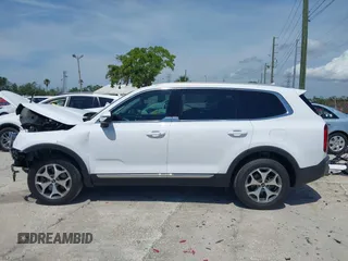 2022 Kia Telluride EX z VIN 5XYP34HC4NG319365, wystawiony jako IAAI lot #41910029 z przebiegiem 27 338 mil mil oraz . Historia ofert i sprzedaży dostępna na DreamBid. Obrazek 14.