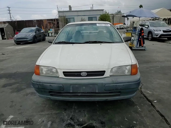 1996 Toyota Tercel DX with VIN JT2AC52L9T0189356, listed as a Copart auction lot 75311564 with NaN miles and Salvage Title. Bid and sale history available at carsss.com. Image 10.