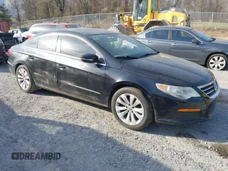 2011 Volkswagen CC Sport with VIN WVWMP7AN1BE719957, listed as a IAAI auction lot 41850816 with 122,860 mi miles. Bid and sale history available at carsss.com. Image 1.