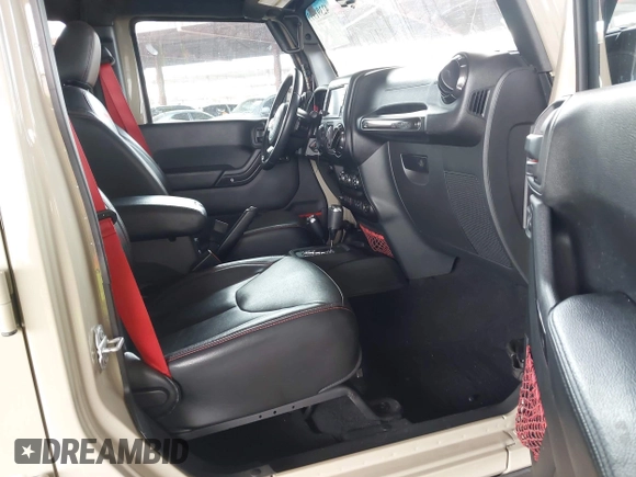 2017 Jeep Wrangler Unlimited Rubicon with VIN 1C4BJWFG7HL663203, listed as a IAAI auction lot 42391999 with 63,430 mi miles and . Bid and sale history available at DreamBid. Image 5.