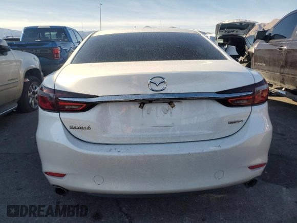 2021 Mazda 6 Touring with VIN JM1GL1VM6M1612064, listed as a Copart auction lot 50189355 with 69,319 mi miles and Salvage Title. Bid and sale history available at DreamBid. Image 6.
