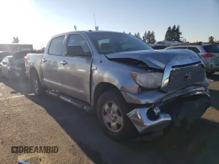 2011 Toyota Tundra 4WD Truck with VIN 5TFDY5F18BX178269, listed as a Copart auction lot 83202154 with 128,034 mi miles and Salvage Title. Bid and sale history available at carsss.com. Image 4.
