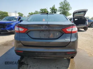 2015 Ford Fusion SE with VIN 3FA6P0HD6FR272418, listed as a Copart auction lot 60294105 with 128,916 mi miles and Salvage title. Bid and sale history available at DreamBid. Image 6.