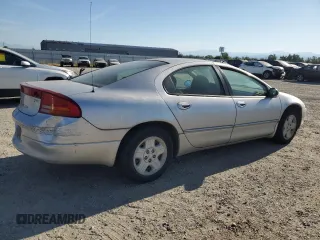 2004 Dodge Intrepid SE z VIN 2B3AD46R54H710035, wystawiony jako Copart lot #58865685 z przebiegiem 74 018 mil mil oraz Czysty tytuł • Clean title. Historia ofert i sprzedaży dostępna na DreamBid. Obrazek 3.