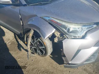 2018 Toyota C-HR XLE with VIN NMTKHMBX3JR048303, listed as a IAAI auction lot 41695246 with 125,081 mi miles. Bid and sale history available at carsss.com. Image 6.