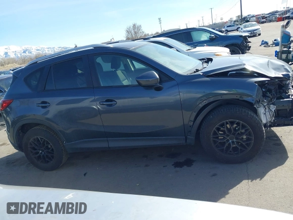 2013 Mazda CX-5 Touring with VIN JM3KE2CE6D0122405, listed as a IAAI auction lot 41743037 with 154,647 mi miles and . Bid and sale history available at carsss.com. Image 14.