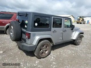 2013 Jeep Wrangler Unlimited Sport with VIN 1C4BJWDG1DL601972, listed as a Copart auction lot 65069824 with 166,274 mi miles and Salvage Title. Bid and sale history available at carsss.com. Image 3.