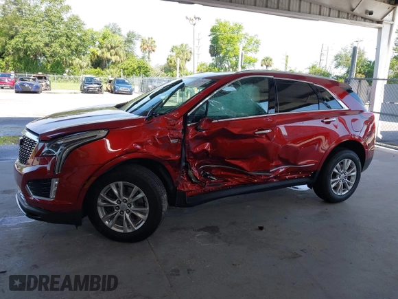 2024 Cadillac XT5 FWD Luxury with VIN 1GYKNAR42RZ738679, listed as a IAAI auction lot 42355530 with 14,660 mi miles and . Bid and sale history available at DreamBid. Image 14.