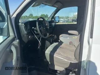 2014 Chevrolet Express Cargo with VIN 1GCWGFCA8E1121812, listed as a IAAI auction lot 42801147 with 128,506 mi miles and . Bid and sale history available at DreamBid. Image 8.