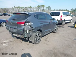 2017 Hyundai Tucson Value with VIN KM8J33A24HU281183, listed as a IAAI auction lot 41563886 with 71,110 mi miles. Bid and sale history available at carsss.com. Image 4.