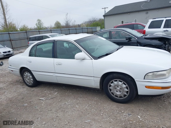 1999 Buick Park Avenue Ultra with VIN 1G4CU5217X4658627, listed as a IAAI auction lot 42013174 with 148,856 mi miles. Bid and sale history available at carsss.com. Image 13.