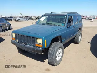 1997 Jeep Cherokee Sport with VIN 1J4FJ68S4VL592390, listed as a IAAI auction lot 41682369 with 194,624 mi miles. Bid and sale history available at carsss.com. Image 6.