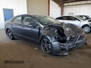 2020 Ford Fusion Titanium with VIN 3FA6P0K92LR115615, listed as a Copart auction lot 60471975 with 73,069 mi miles and Salvage title. Bid and sale history available at DreamBid. Image 4.