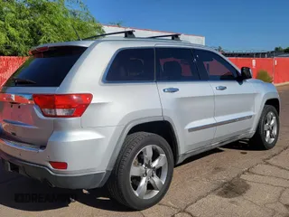 2011 Jeep Grand Cherokee Overland with VIN 1J4RR6GG7BC745066, listed as a Copart auction lot 66415905 with 164,264 mi miles and Clean title. Bid and sale history available at DreamBid. Image 4.