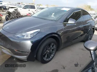 2025 Tesla Model Y Long Range with VIN 7SAYGDED6SF229498, listed as a IAAI auction lot 41086718 with 509 mi miles and . Bid and sale history available at DreamBid. Image 18.