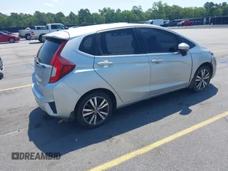 2015 Honda Fit EX-L z VIN 3HGGK5H82FM727678, wystawiony jako IAAI lot #42451860 z przebiegiem 102 512 mil mil oraz . Historia ofert i sprzedaży dostępna na DreamBid. Obrazek 4.