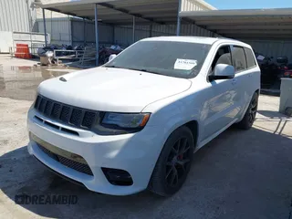 2017 Jeep Grand Cherokee SRT with VIN 1C4RJFDJ0HC699537, listed as a IAAI auction lot 41781500 with 105,640 mi miles. Bid and sale history available at carsss.com. Image 17.