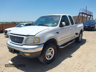 1999 Ford F-150 XL z VIN 1FTRX08L5XKA73493, wystawiony jako IAAI lot #42467358 z przebiegiem Nie podano mil oraz . Historia ofert i sprzedaży dostępna na DreamBid. Obrazek 2.