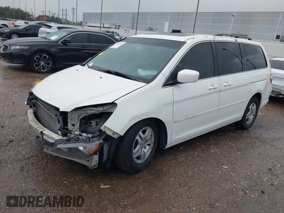 2007 Honda Odyssey EX-L z VIN 5FNRL38737B072789, wystawiony jako IAAI lot #41203148 z przebiegiem 156 828 mil mil oraz . Historia ofert i sprzedaży dostępna na DreamBid. Obrazek 19.