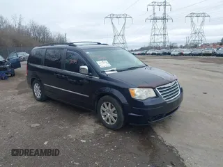 2010 Chrysler Town & Country Touring with VIN 2A4RR5DX6AR153291, listed as a IAAI auction lot 41792330 with 113,936 mi miles. Bid and sale history available at carsss.com. Image 1.