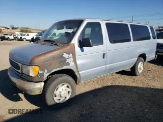 1999 Ford Econoline Passenger XL with VIN 1FBSS31L6XHB60672, listed as a Copart auction lot 79319714 with 295,551 mi miles and Clean Title. Bid and sale history available at DreamBid. Image 1.