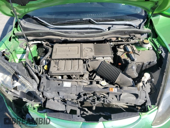 2011 Mazda 2 Touring z VIN JM1DE1HZ4B0115764, wystawiony jako Copart lot #56161455 z przebiegiem 134 274 mil mil oraz Szkoda całkowita • Salvage title. Historia ofert i sprzedaży dostępna na DreamBid. Obrazek 11.