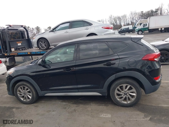 2017 Hyundai Tucson SE Plus with VIN KM8J33A49HU584557, listed as a IAAI auction lot 41853951 with 105,602 mi miles. Bid and sale history available at carsss.com. Image 14.