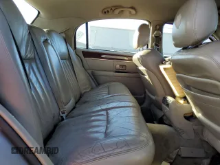 2003 Lincoln Town Car Signature z VIN 1LNHM82W73Y612608, wystawiony jako Copart lot #88304985 z przebiegiem Nie podano mil oraz Nie do naprawy • Non repairable. Historia ofert i sprzedaży dostępna na DreamBid. Obrazek 10.
