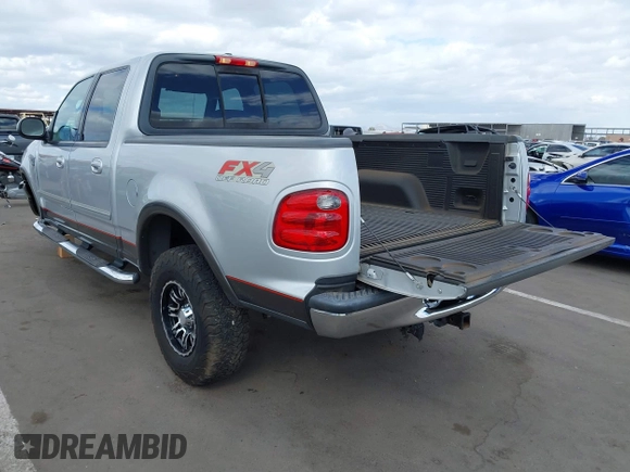 2003 Ford F-150 XLT with VIN 1FTRW08LX3KC79700, listed as a IAAI auction lot 41680562 with 131,052 mi miles. Bid and sale history available at carsss.com. Image 3.