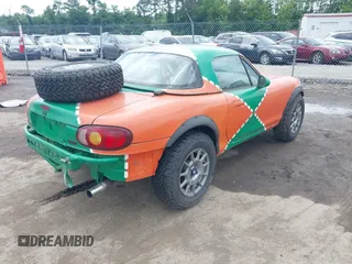 1999 Mazda MX-5 Miata with VIN JM1NB3531X0116676, listed as a IAAI auction lot 42454285 with 201,534 mi miles and . Bid and sale history available at DreamBid. Image 4.