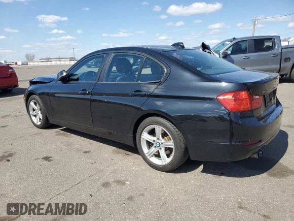 2014 BMW 3 Series 328i xDrive with VIN WBA3B3C58EJ977546, listed as a Copart auction lot 53090185 with 134,823 mi miles and Salvage Title. Bid and sale history available at DreamBid. Image 2.
