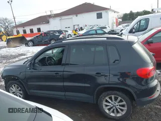 2017 Volkswagen Tiguan S with VIN WVGBV7AX7HK047973, listed as a IAAI auction lot 41197329 with 92,960 mi miles and . Bid and sale history available at DreamBid. Image 14.