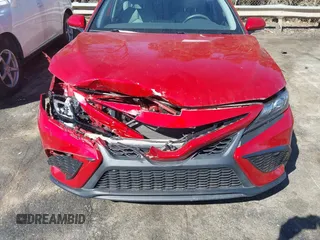 2021 Toyota Camry SE Nightshade with VIN 4T1G11AK1MU405019, listed as a IAAI auction lot 41822878 with 52,174 mi miles and . Bid and sale history available at DreamBid. Image 6.