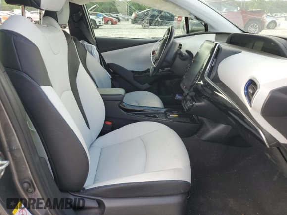 2022 Toyota Prius L Eco z VIN JTDKAMFU8N3173133, wystawiony jako Copart lot #54865615 z przebiegiem 100 876 mil mil oraz Szkoda całkowita • Salvage title. Historia ofert i sprzedaży dostępna na DreamBid. Obrazek 7.