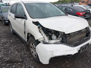 2014 Honda CR-V LX with VIN 5J6RM4H30EL088372, listed as a IAAI auction lot 42171542 with 70,418 mi miles and . Bid and sale history available at carsss.com. Image 6.