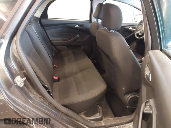 2016 Ford Focus SE with VIN 1FADP3F20GL234077, listed as a IAAI auction lot 41933546 with 106,184 mi miles and . Bid and sale history available at DreamBid. Image 8.