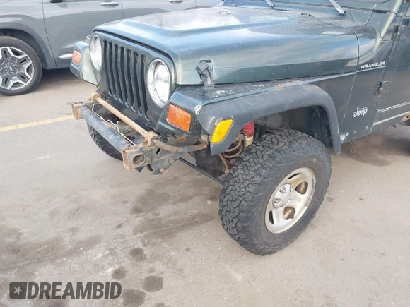 1998 Jeep Wrangler SE with VIN 1J4FY29P1WP760687, listed as a IAAI auction lot 41720889 with 210,592 mi miles. Bid and sale history available at carsss.com. Image 12.