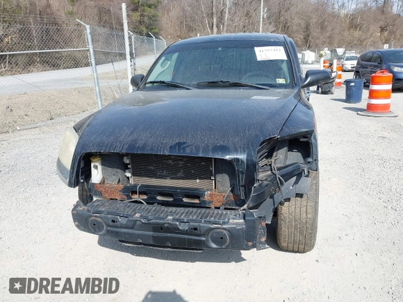 2006 Mitsubishi Raider LS with VIN 1Z7HC22K56S561574, listed as a IAAI auction lot 41757412 with 216,559 mi miles. Bid and sale history available at carsss.com. Image 6.