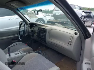 1999 Ford Explorer XL z VIN 1FMDU34X5XUC08663, wystawiony jako IAAI lot #42385444 z przebiegiem 177 387 mil mil oraz . Historia ofert i sprzedaży dostępna na DreamBid. Obrazek 5.