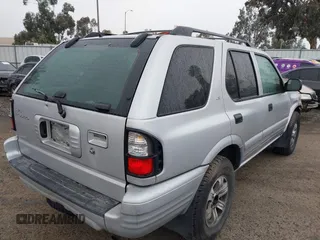 2001 Isuzu Rodeo S with VIN 4S2CK58W614361048, listed as a IAAI auction lot 41681566 with 133,460 mi miles and . Bid and sale history available at DreamBid. Image 4.