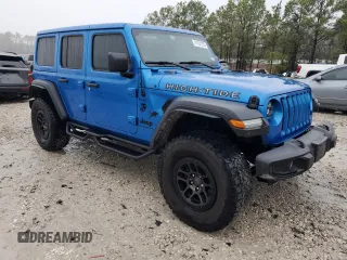 2023 Jeep Wrangler Sport S with VIN 1C4HJXDGXPW692324, listed as a Copart auction lot 41761235 with 15,660 mi miles and Salvage Title. Bid and sale history available at DreamBid. Image 4.
