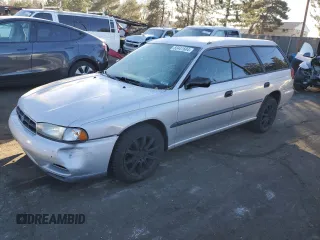 1998 Subaru Legacy L with VIN 4S3BK4355W7307746, listed as a Copart auction lot 83441604 with 211,023 mi miles and Salvage title. Bid and sale history available at DreamBid. Image 1.