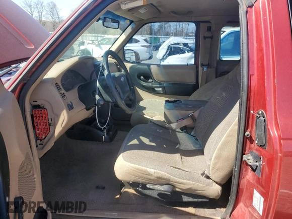 2002 Ford Ranger XL Fleet with VIN 1FTZR45E12TA11258, listed as a Copart auction lot 46797715 with 219,473 mi miles and Salvage Title. Bid and sale history available at DreamBid. Image 7.