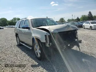 2014 Chevrolet Tahoe LTZ with VIN 1GNSKCE03ER201981, listed as a Copart auction lot 56421125 with 173,710 mi miles and Salvage title. Bid and sale history available at DreamBid. Image 14.