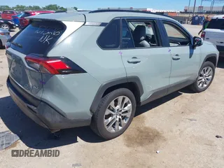 2021 Toyota RAV4 XLE Premium with VIN 2T3C1RFV0MW140682, listed as a IAAI auction lot 42315813 with 98,267 mi miles and . Bid and sale history available at DreamBid. Image 4.