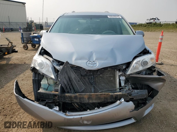 2014 Toyota Sienna Limited with VIN 5TDDK3DC4ES073698, listed as a Copart auction lot 60848915 with 418,121 mi miles and Salvage title. Bid and sale history available at DreamBid. Image 5.