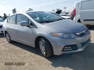 2012 Honda Insight LX z VIN JHMZE2H56CS001570, wystawiony jako IAAI lot #41461236 z przebiegiem 129 431 mil mil oraz . Historia ofert i sprzedaży dostępna na DreamBid. Obrazek 1.