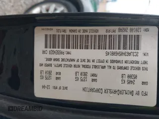 2005 Chrysler 300 with VIN 2C3JA63H05H608145, listed as a IAAI auction lot 42075474 with 167,098 mi miles. Bid and sale history available at carsss.com. Image 9.
